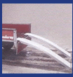 Loading ramps are easily mounted on a trailer